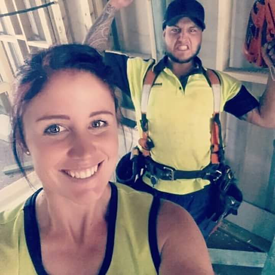 First-year carpentry apprentice Alison Knights and fellow tradie Daniel Johnstone share a laugh while working on a building site. Plans are afoot to see more female tradies in Canberra’s construction industry. Photo: Alison Knights.