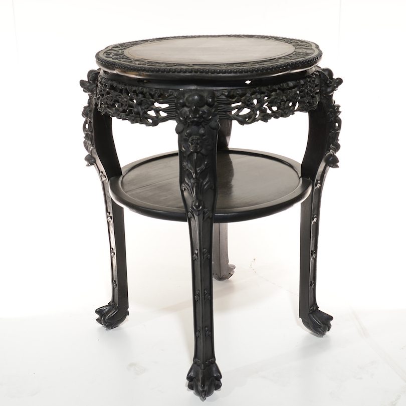 A Chinese export carved hongmu and marble inset wine table circa 1900 that’s likely to fetch a high price in the upcoming sale on ALLBIDS. 