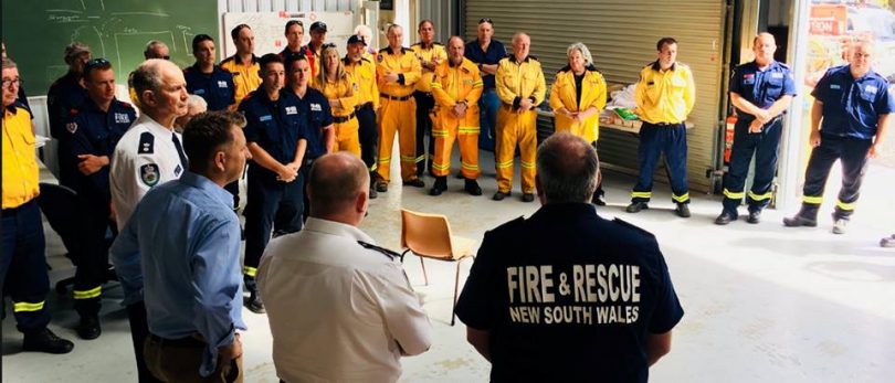 Bega Valley members of the RFS and FRNSW get together in the days after March 18 at the Tathra RFS shed to show there support for each other. Photo: Tathra RFS Facebook.