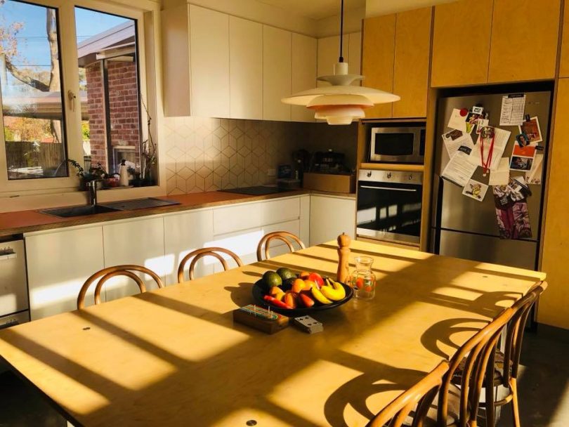 Let the sunshine in. This kitchen is flooded with warming sunlight despite it being mid-winter and the shortest day of the year, thanks to good design. Photo: Supplied