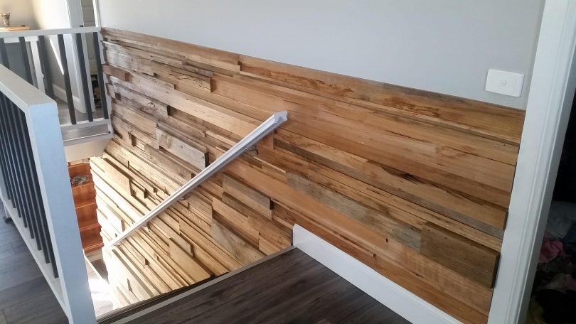 Alison loves the hands-on component of her job. This is a feature hardwood timber wall she built at her own home. Photo: Alison Knights.