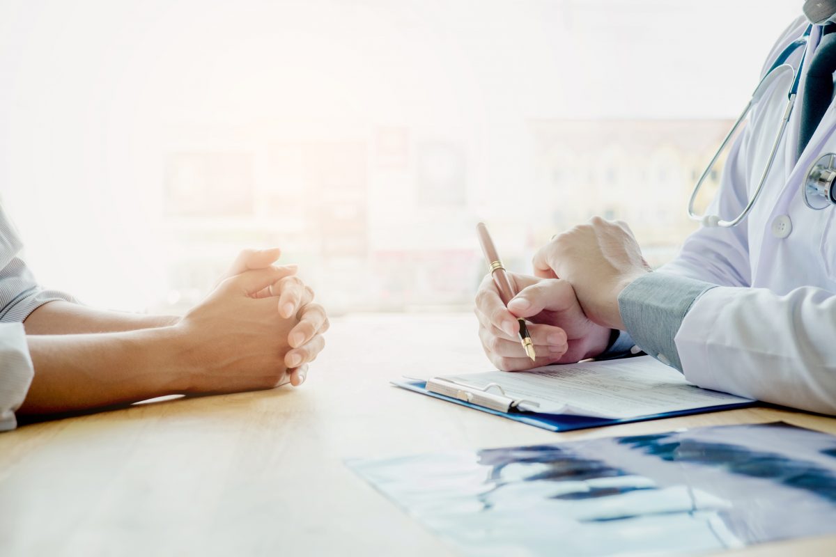 Two people in medical consultation