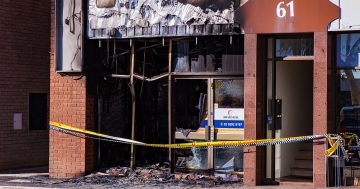 Man charged over Phillip massage parlour fire