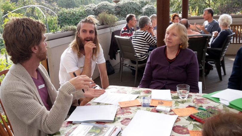 Members of Cohousing Canberra planning their housing project proposal. Photo: Edwina Robinson.