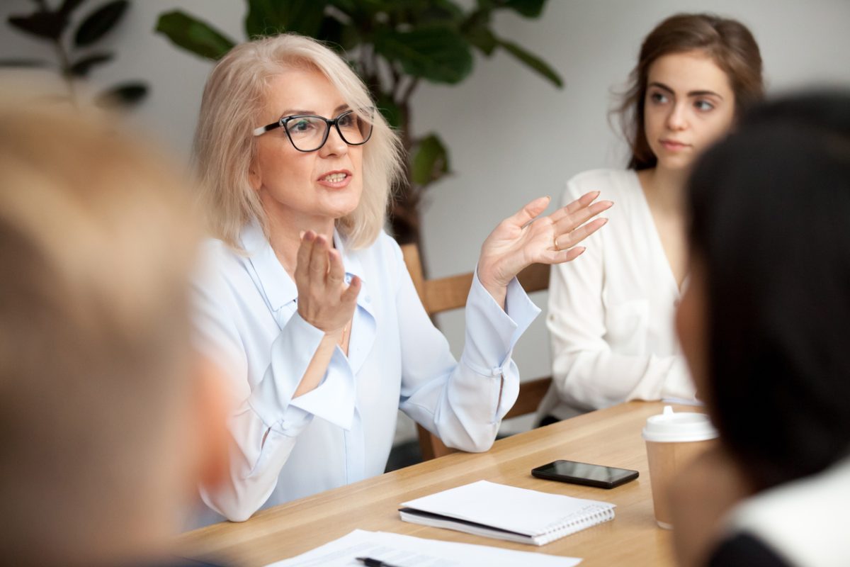 Woman talking at a meeting