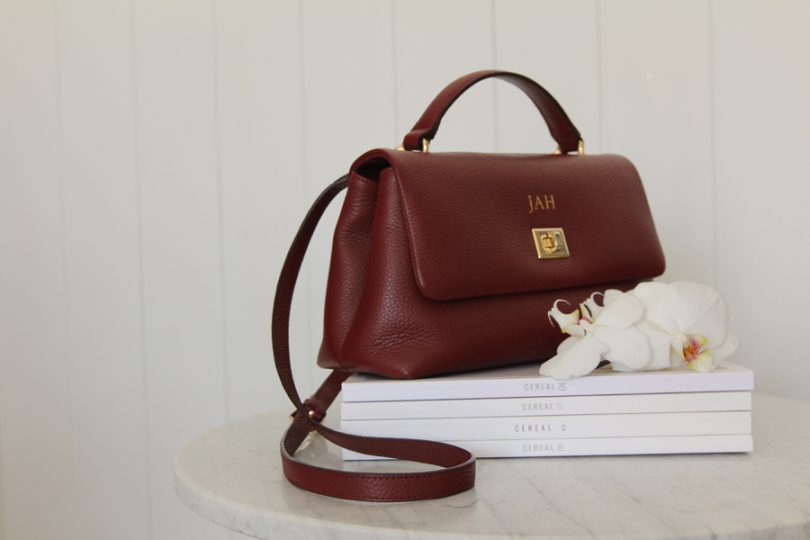 The classic top handle bag in burgundy. Photos: Jade Hansen.