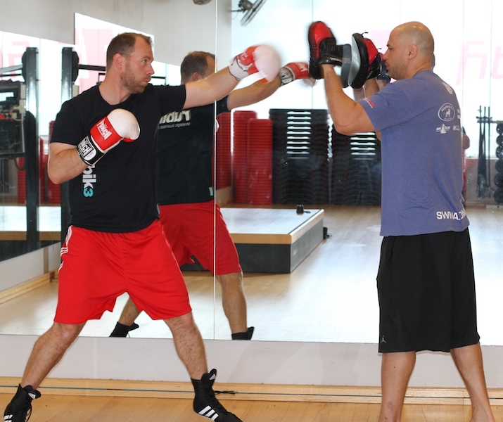 John is a boxing enthusiast and is with his trainer Stev Rudic, a Commonwealth Games medallist, training for an upcoming Boxing ACT event. Photos: Daniella Jukic.