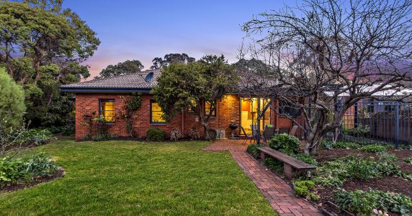 Follow the red brick road to this delightful, renovated home in O'Connor