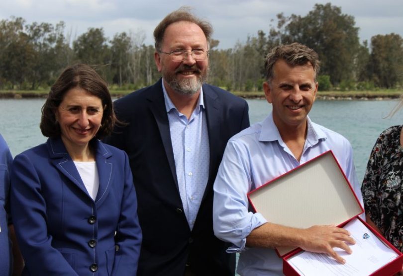 SW Premier Gladys Berejiklian, Dr Michael Holland, and Member for Bega, Andrew Constance holding the One Eurobodalla Hospital petition. Photo: Ian Campbell.