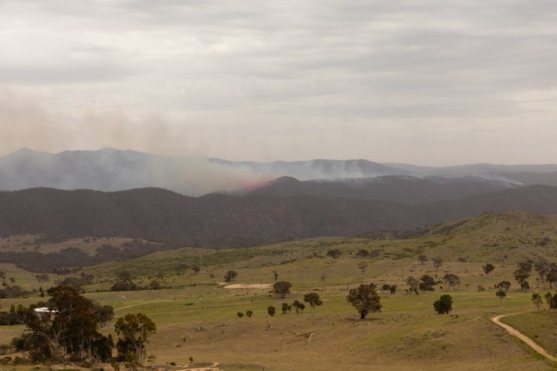 The fire is burning erratically about 8km from the nearest suburb.
