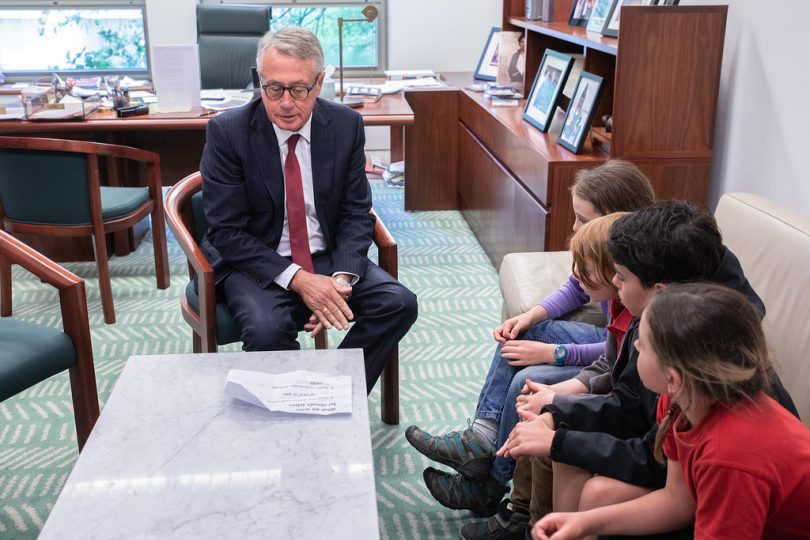 A break out in democracy: kids meeting Labor MP Wayne Swan and discussing key concerns.