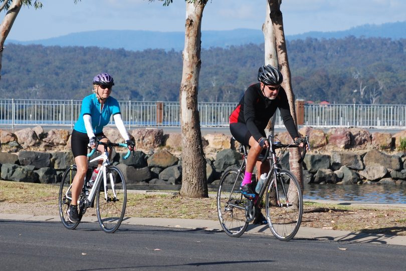 David and Louise Brand, cycling in Merimbula. Photo: Supplied.