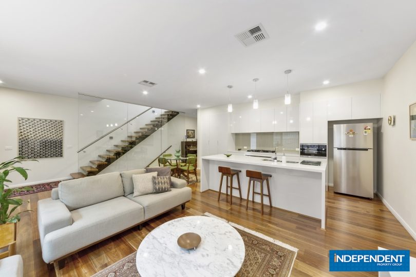 Floating Spotted Gum floorboards feature throughout