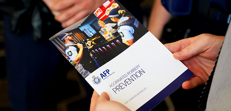 Police launch guidebook to help Canberra businesses thwart armed robberies