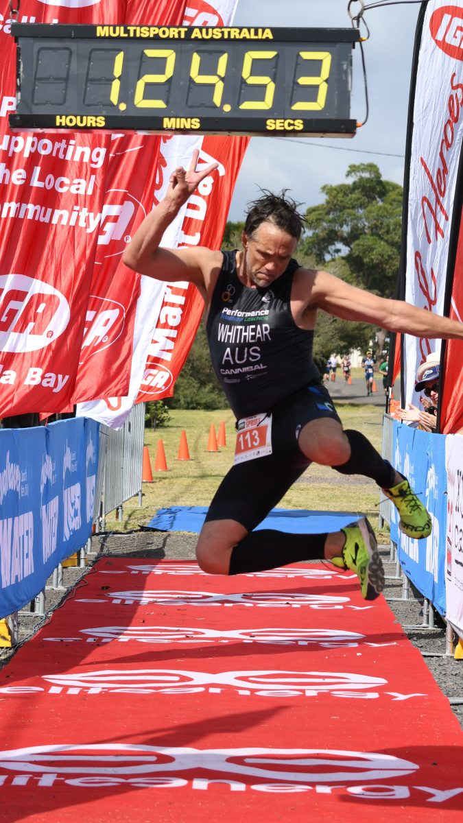 Mark crosses the finish line. Photo: Supplied.