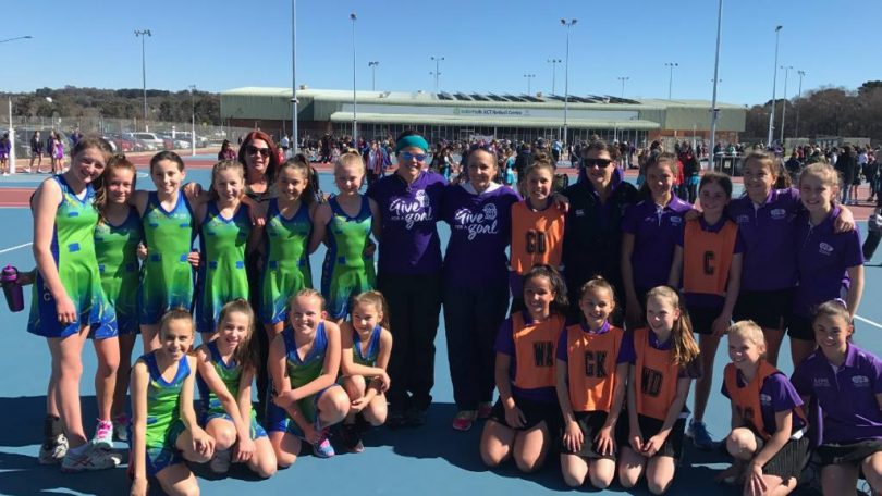Benita Bittner (right) with Louise Bilston (left) with Netball ACT registered players. Photo: Supplied.