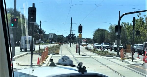 Car driven along light rail tracks in Gungahlin and taxi near miss as safety concerns continue
