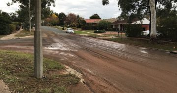 Burst water main causes flooding and discoloured water in Higgins