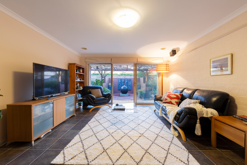  Floor-to-ceiling windows throughout the home admit abundant light.