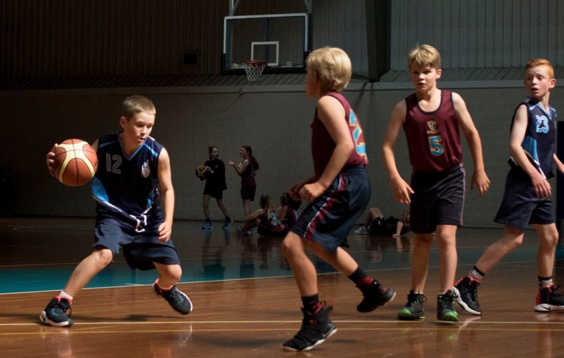 Young boys playing basketball