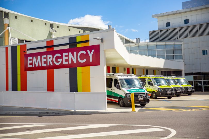 Exterior of emergency department and ambulances at Calvary Hospital.