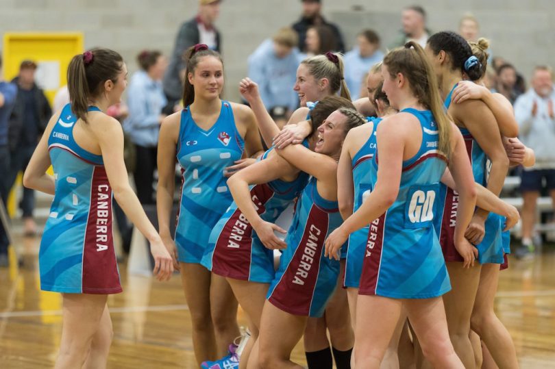 Canberra Netball Association team members rejoice after winning the ACT division one grand final against Arawang on Sunday. Photo: Ben Southall Photography.