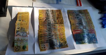 Two men arrested after police seize cash, car in Queanbeyan