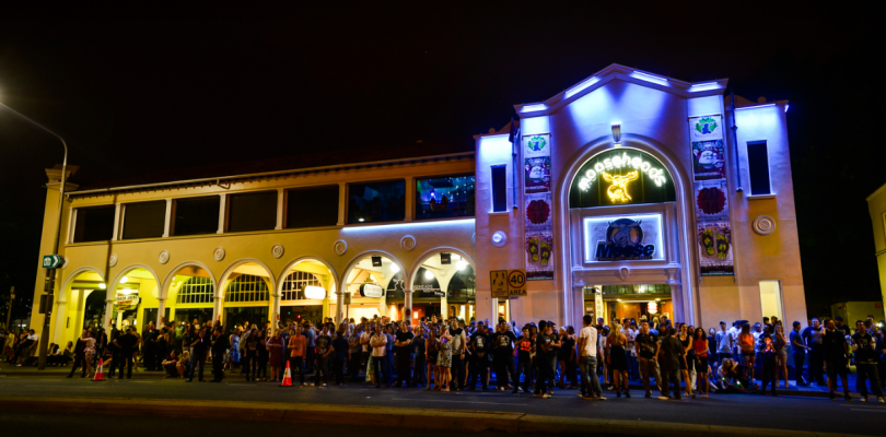 Crowd of people gathered outside Mooseheads in Civic