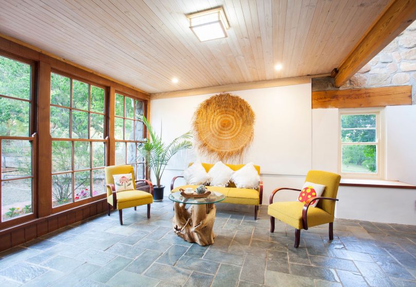 Slate flooring and soaring ceilings with Oregon beams. Photo: Supplied