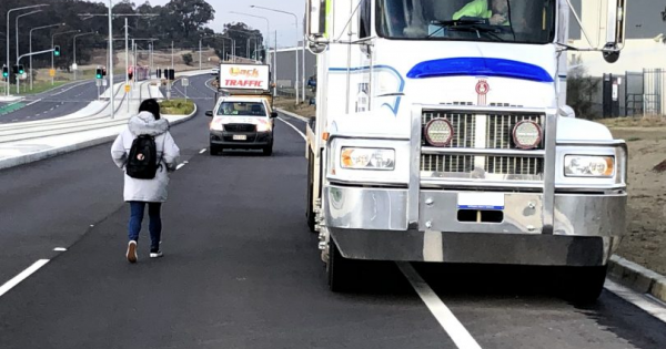 No footpath from Mitchell light rail stop leaves pedestrians stranded