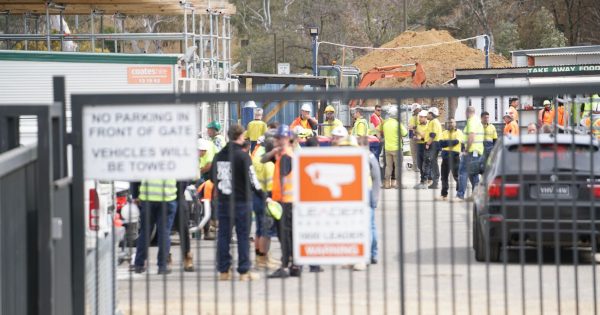Man in critical condition after falling 10 metres at Dickson construction site