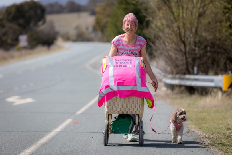 Adrienne Carpenter and Phoebe walking the highway