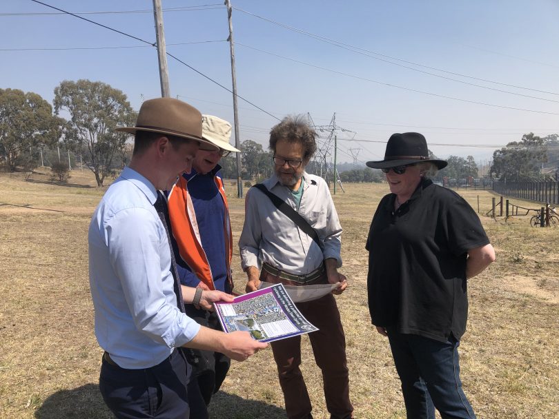 Chris Steel with community representatives