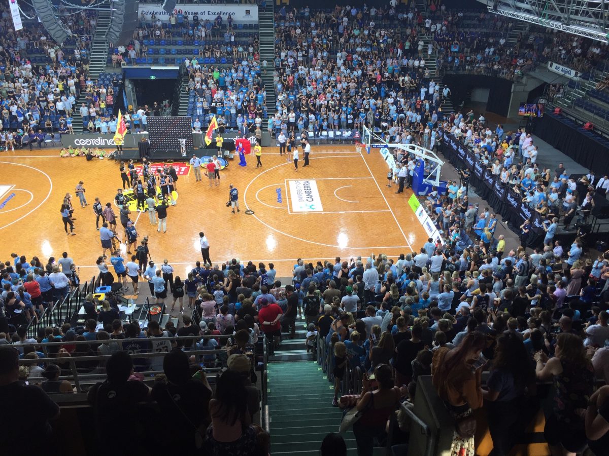 Spurred on by the crowd, the UC Caps won against the Adelaide Lightning in 2018/19 grad final. Photo: Jennifer Andrew