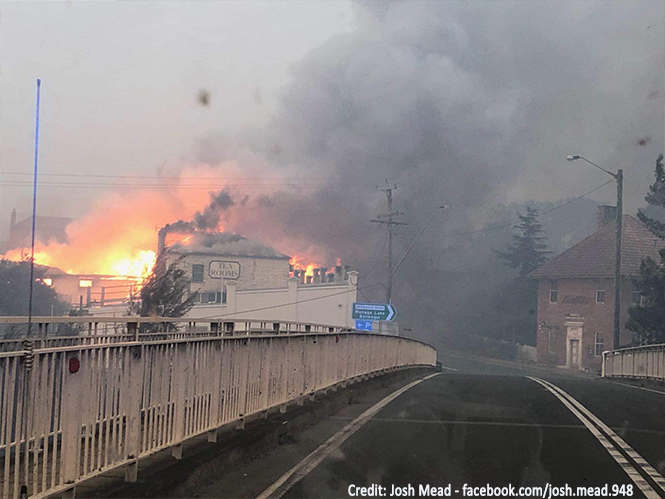 Cobargo's main street burning during bushfire.