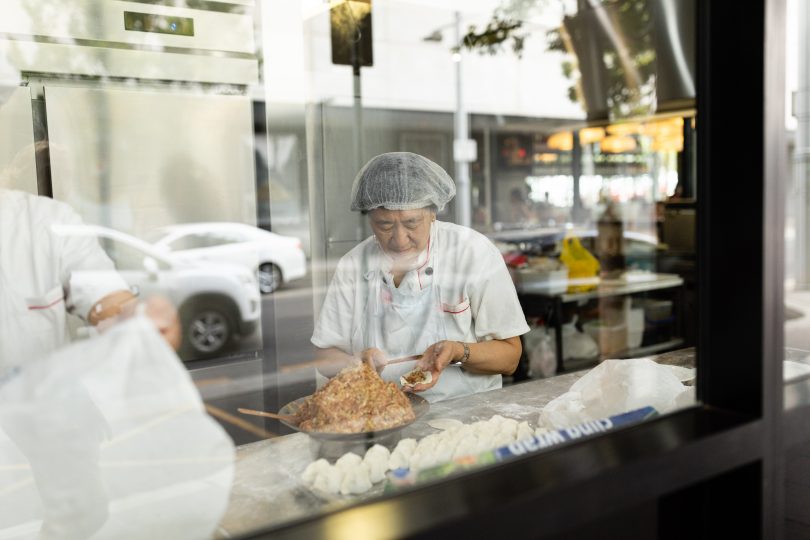 Woman making dumplings