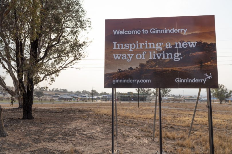 'Welcome to Ginninderry' sign on vacant lot of land