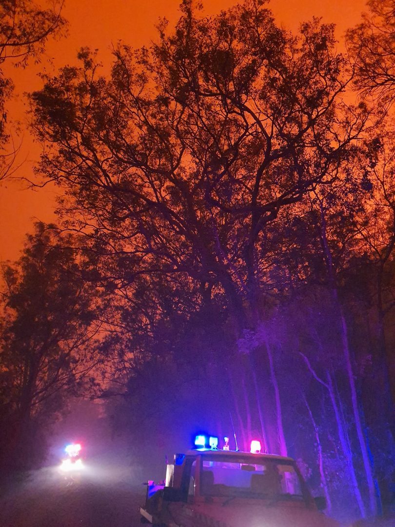 RFS trucks in bush during bushfire in Moruya.