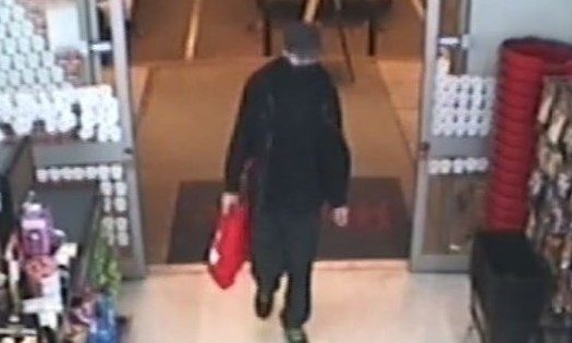 Police release images of alleged supermarket robber