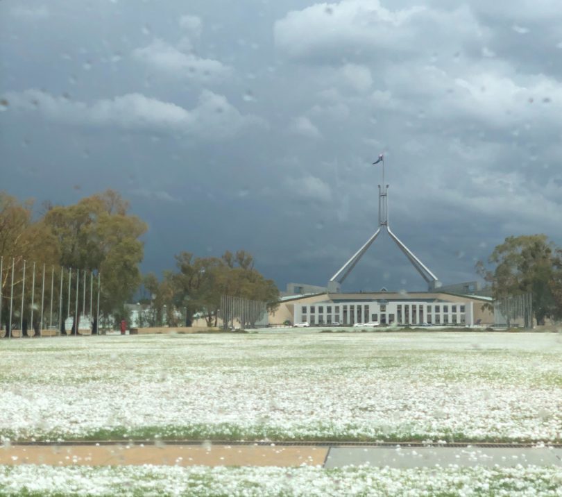 Parliament House lawn covered in hail