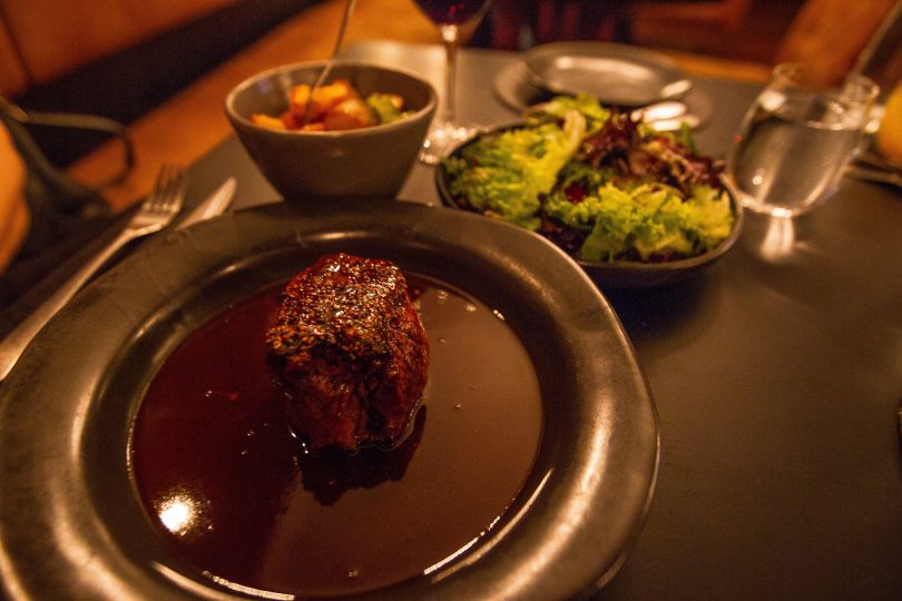 Pepper steak with crispy duck fat potatoes and a fresh garden salad. Photo: Robert Pepper