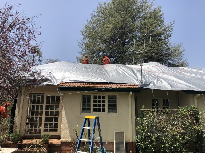ACTSES working on a roof
