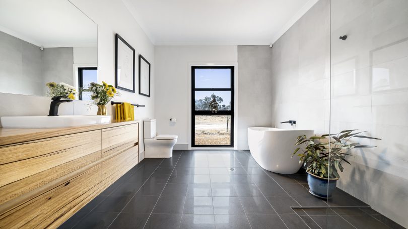 A full-size freestanding bath adds to the luxury family bathroom. 