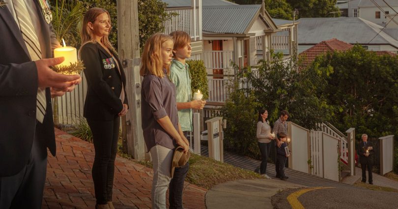 Artist's impression of people standing on driveways to commemorate Anzac Day