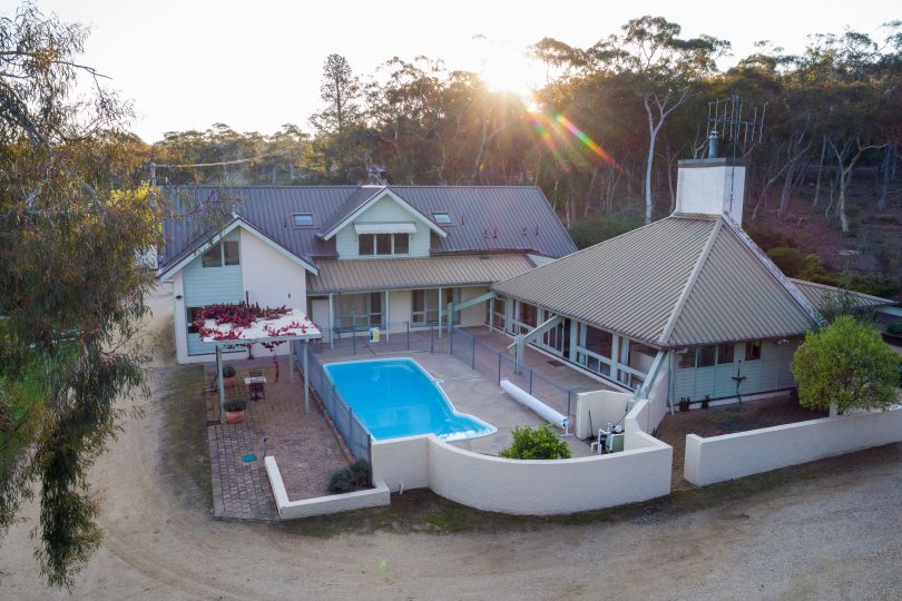 Aerial view of Scribbly Gums property with pool in foreground and bushland in background.