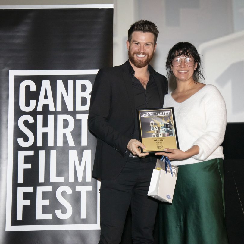 Nick Cain holding his CSFF best actor award with Adi Watters.