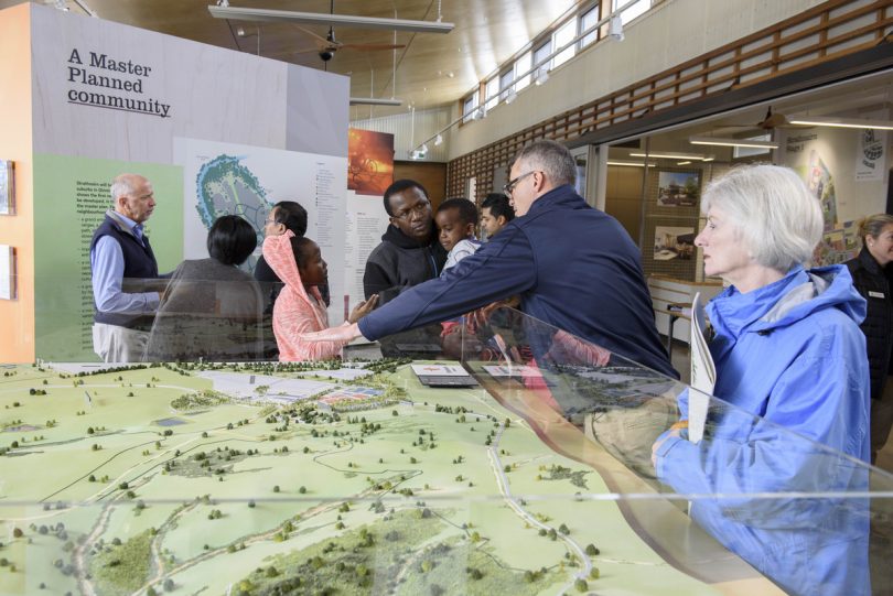 Potential buyers look over the master plan for the Ginninderry precinct. 