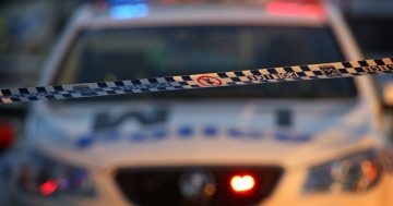 Appeal for help after axe-wielding man robs Gungahlin business