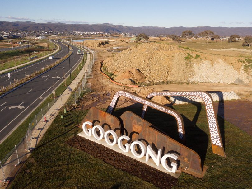 Wide image of sculpture at the entrance to Googong