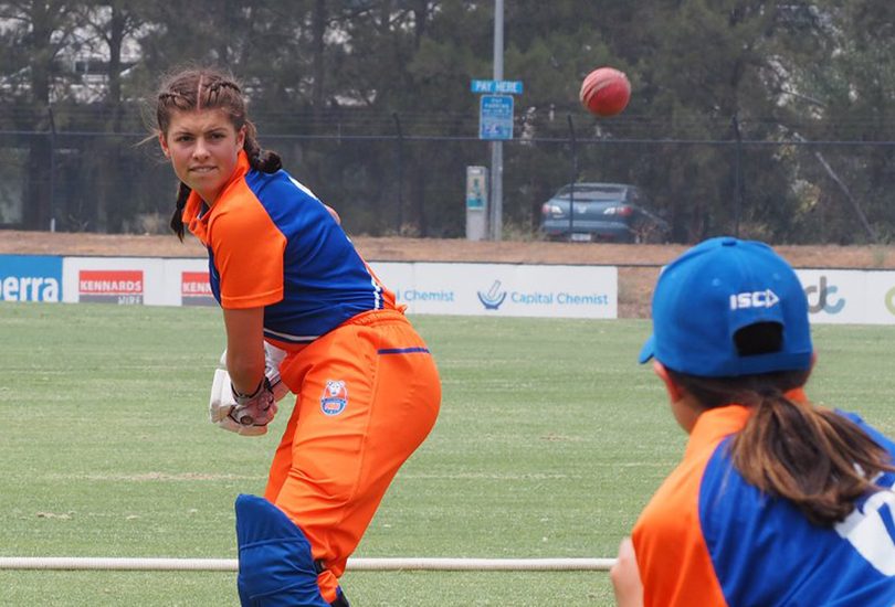 Southern Pride batter warming up on game day in Female T20 Bash.